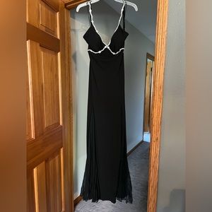 Stunning black special occasion gown with rhinestone accented bust and straps
